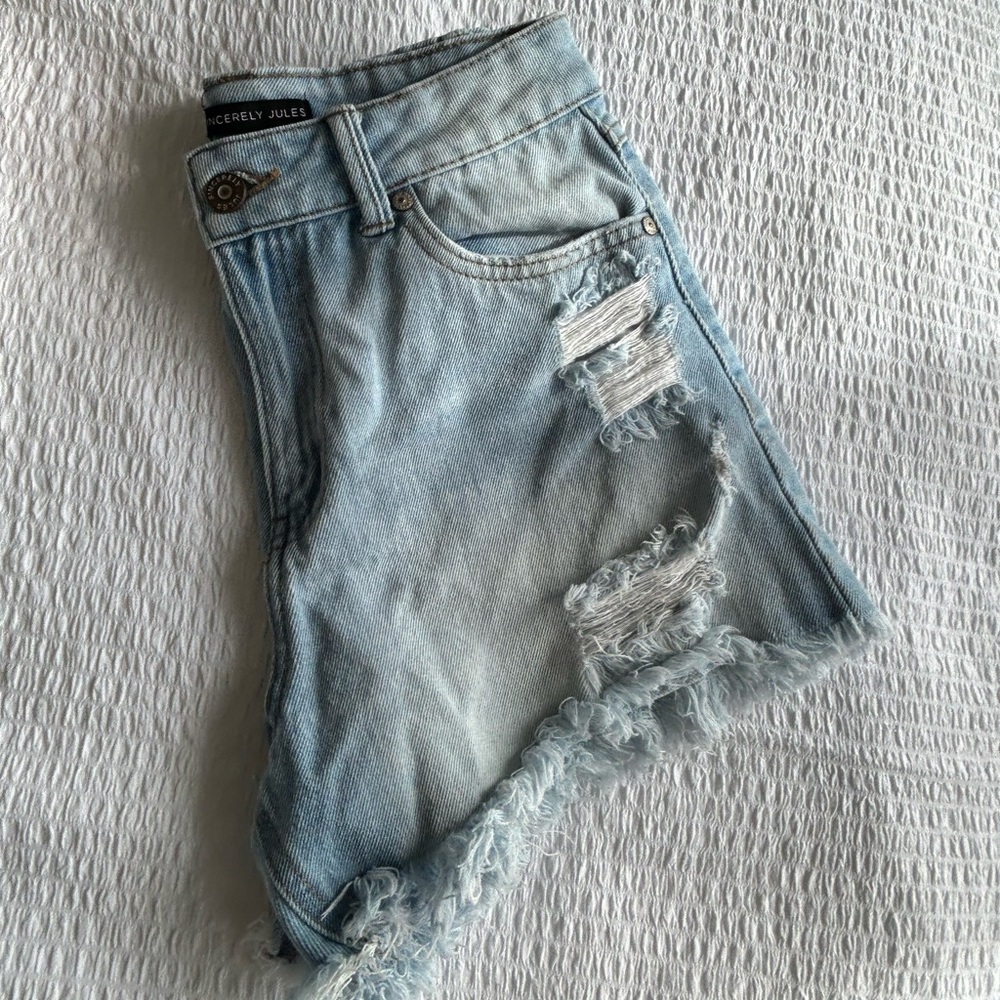 Distressed denim shorts